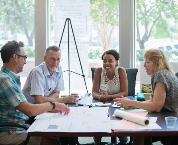 staff meeting in Library